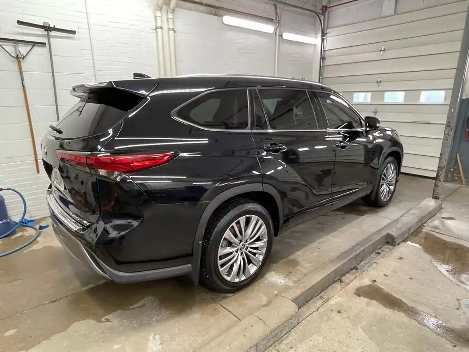 Black Toyota Highlander after an exterior detail in the bay